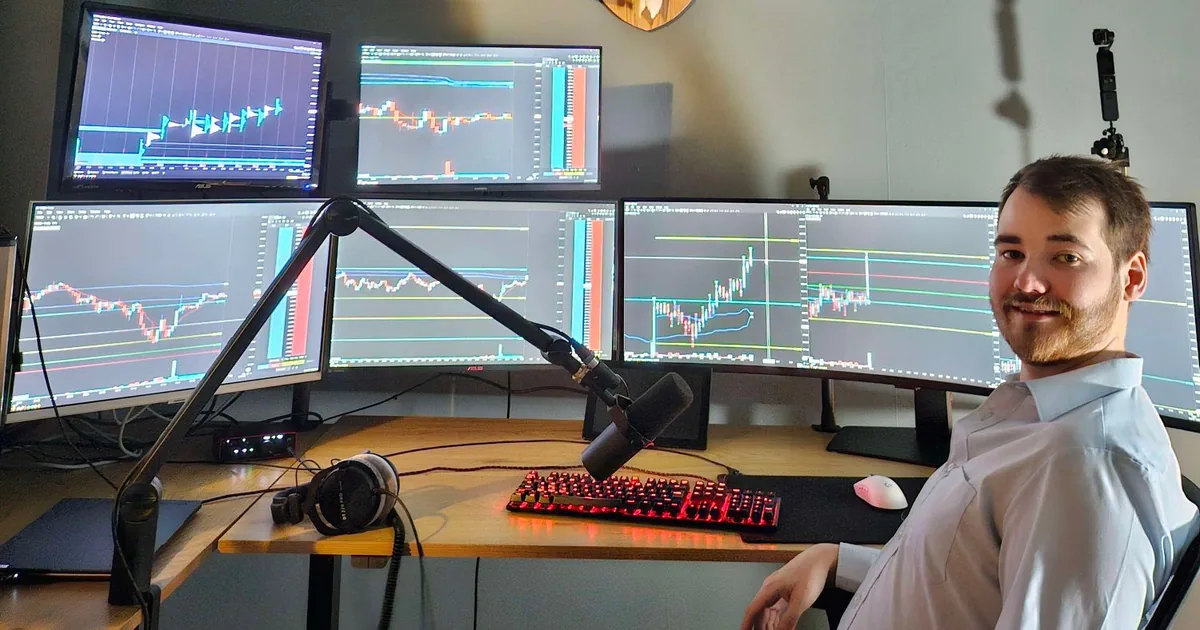Joakim Jusell at his futures trading desk with order flow and price charts on several monitors